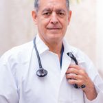 Confident senior male doctor with a stethoscope, representing healthcare professionalism.